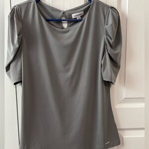 Calvin Klein women’s dressy top.